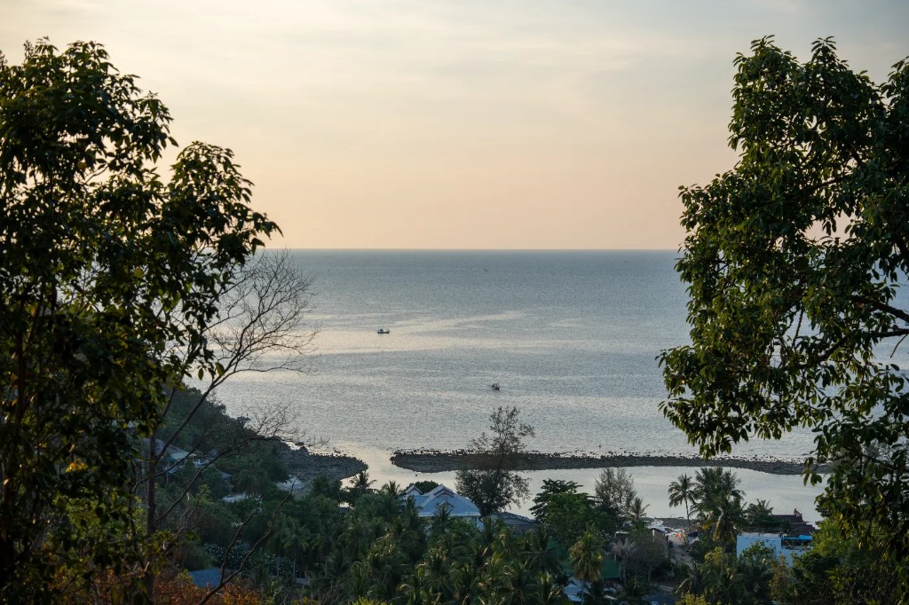 Haad Salad bay with breakwater at dusk
