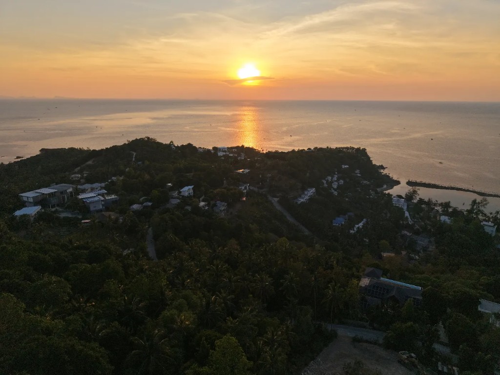 Aerial sunset view of the Haad Salad headland